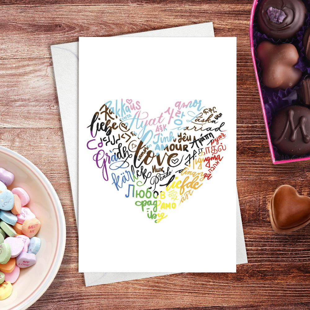 A lifestyle view of the greeting card: "The Language of Love"