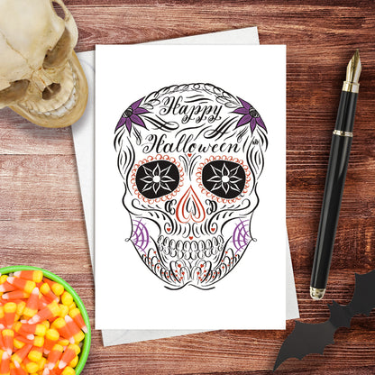 A lifestyle view of the halloween calligraphy card "sugar skull" design