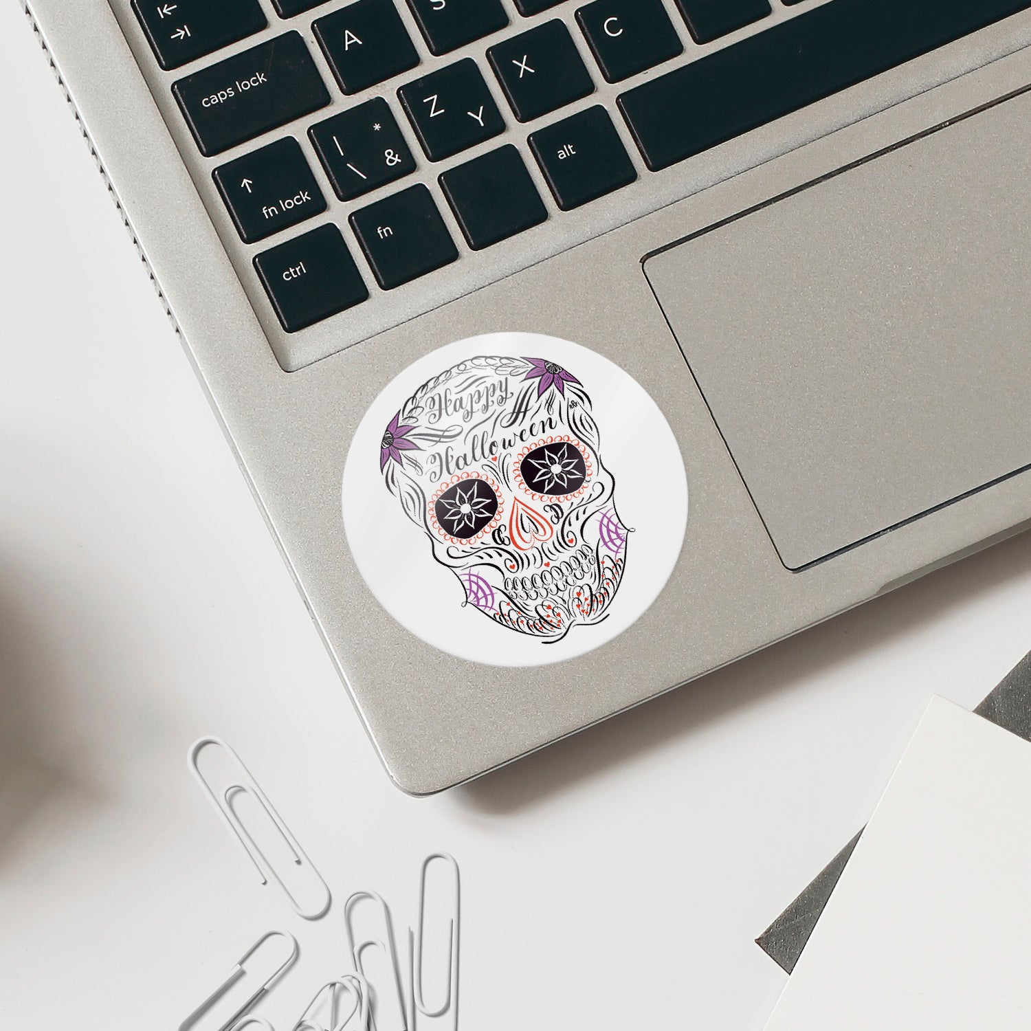 Lifestyle sticker application image: sugar skull, calligraphic drawing