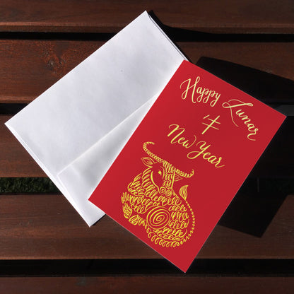 A top view of the greeting card: "Happy Lunar New Year"