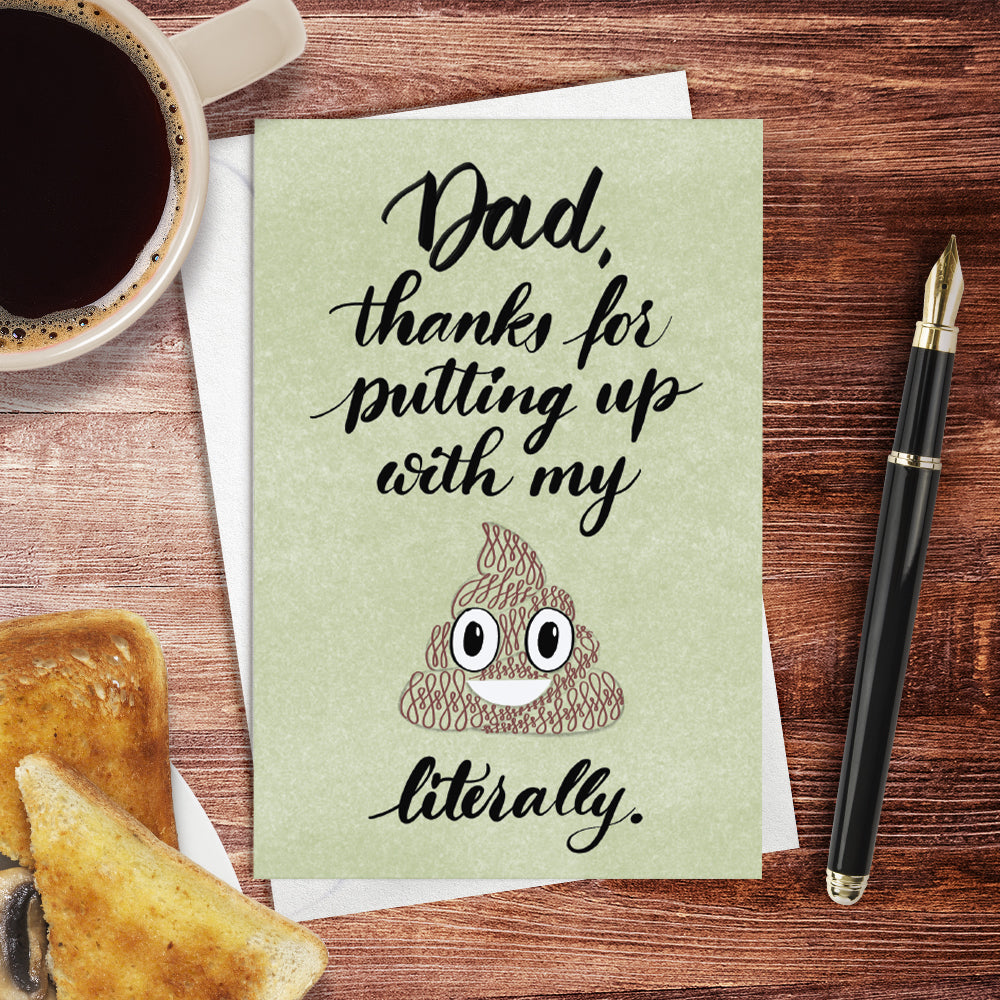 A lifestyle view of the Toronto Calligraphy greeting card: "Dad, thanks for putting up with my crap. Literally."