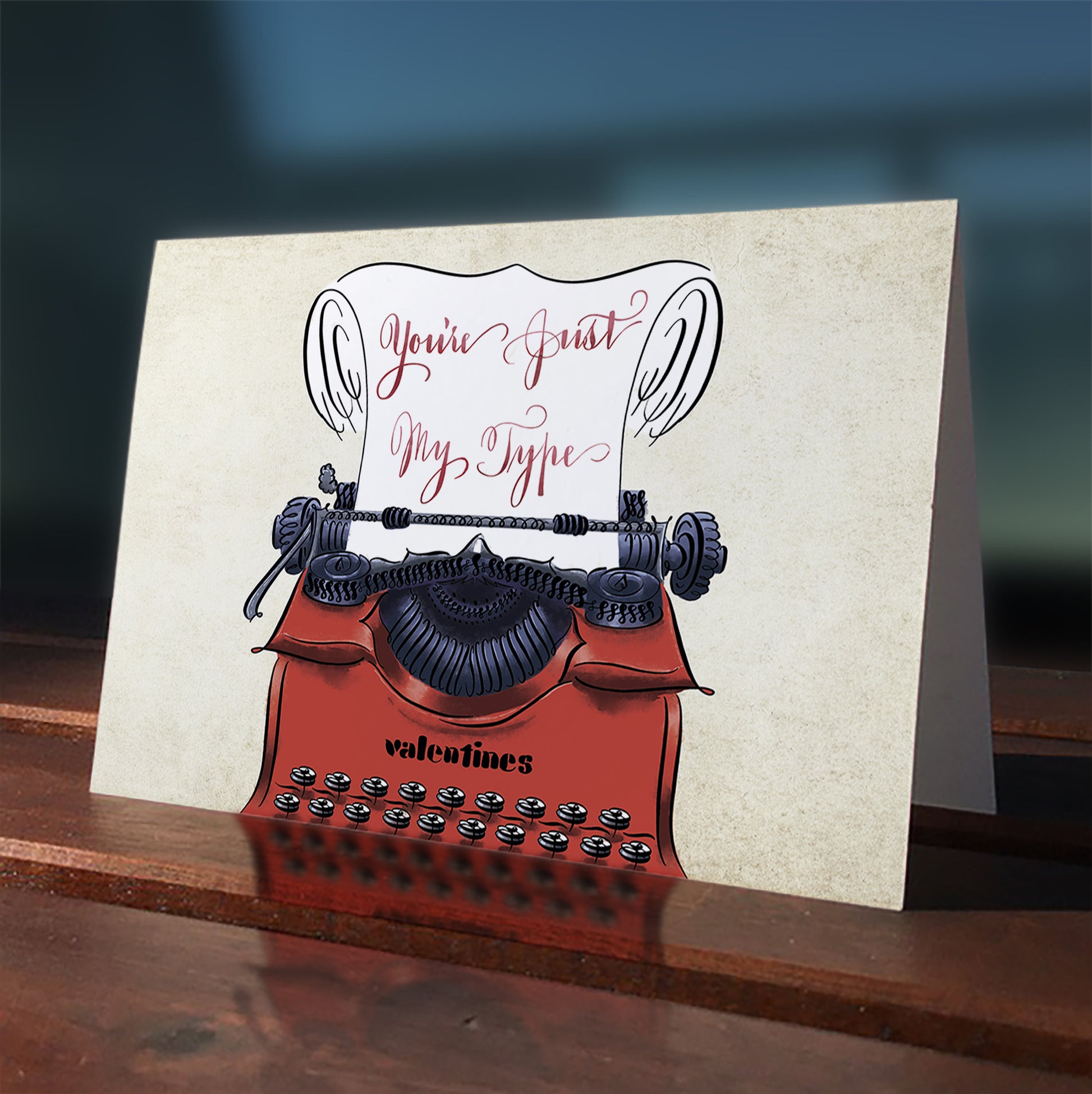 Lifestyle outdoor image: Calligraphy valentines anniversary typewriter greeting card: You're Just My Type